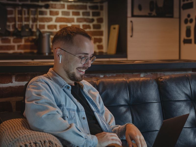 A consultant working on a laptop