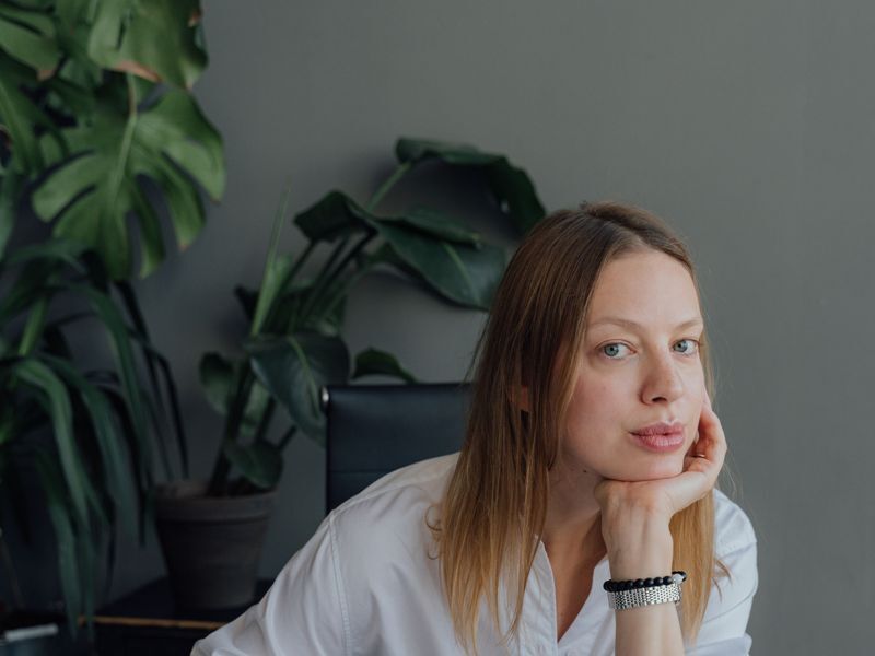 A designer at a desk with colour swatches